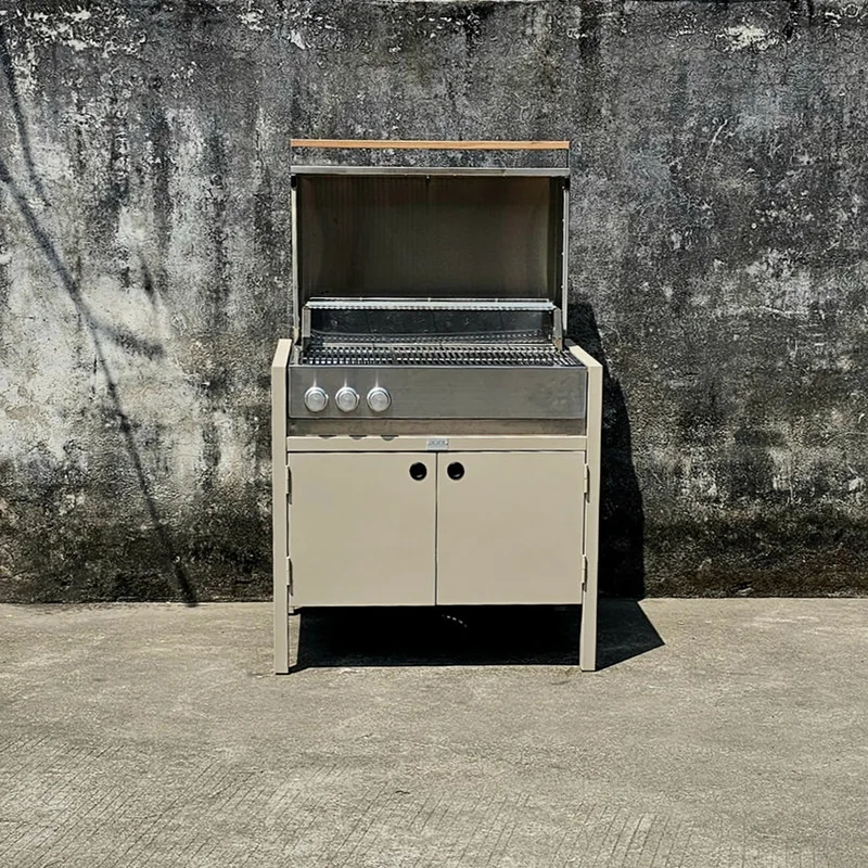 Kanpoko sukaldeko armairua parrillarekin