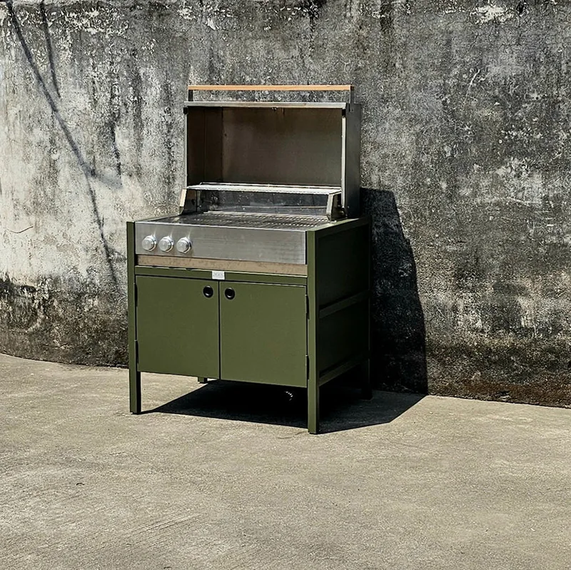 Kanpoko sukaldeko armairua parrillarekin